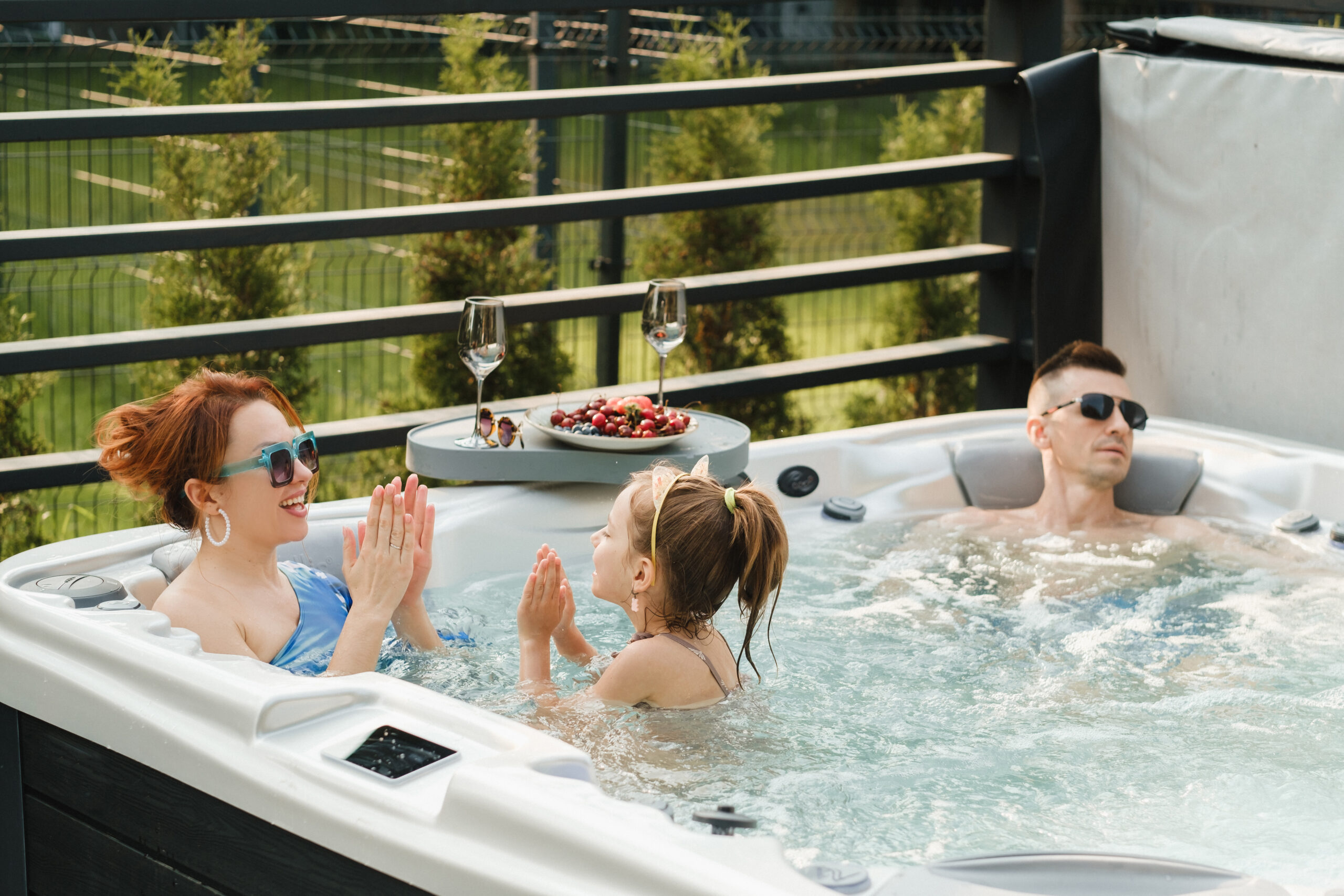 Guest enjoying a private hot tub at a vacation rental